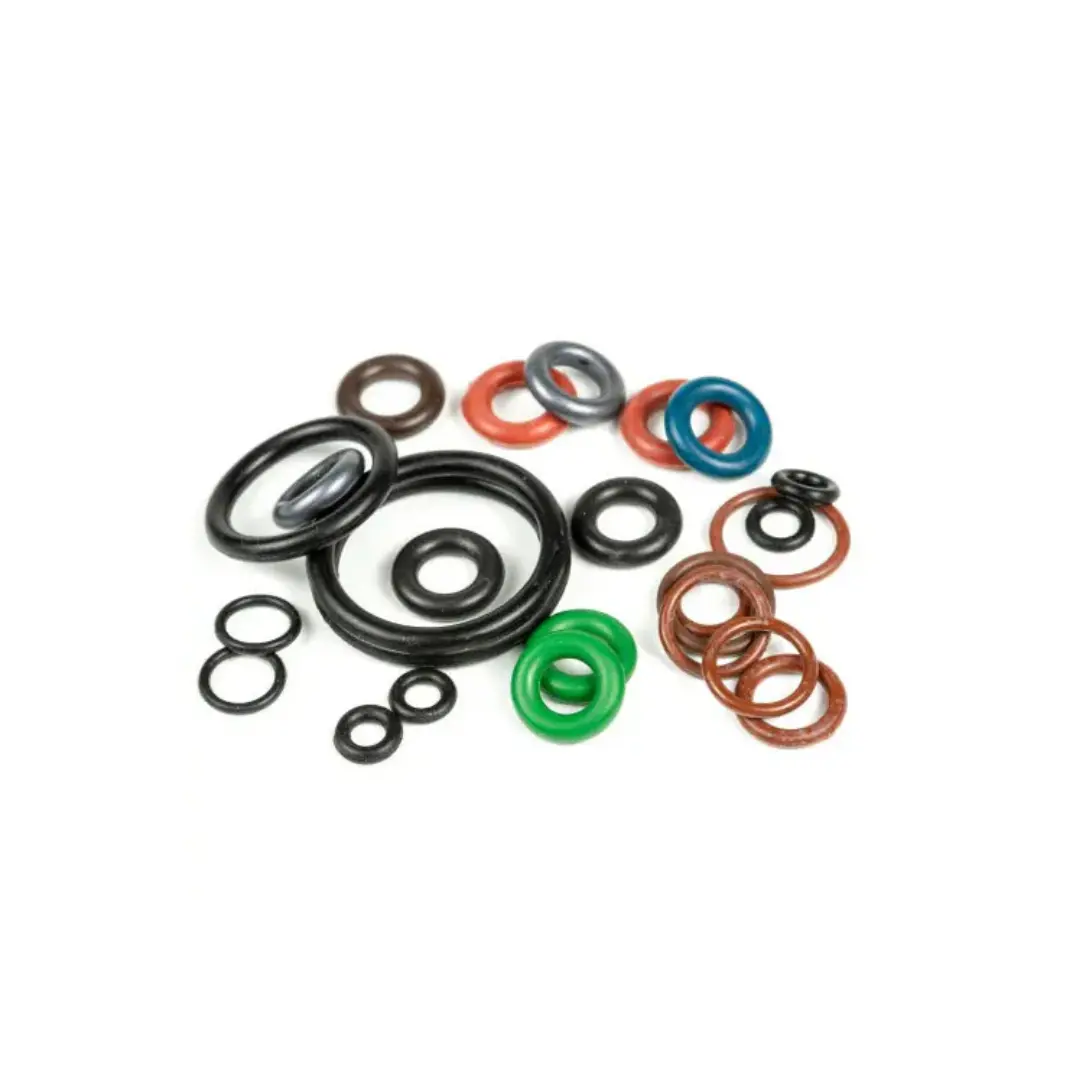 Collection of circular rubber O-rings in various sizes and colors, arranged on a white surface.