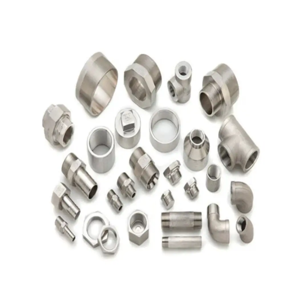 Collection of metallic pipe fittings and connectors such as elbows, couplings, reducers, and threaded adapters.